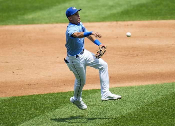Jul 18, 2021; Kansas City, Missouri, USA; Kansas City Royals second baseman Nicky Lopez (8) throws to first base against the Baltimore Orioles during the second inning at Kauffman Stadium. Mandatory Credit: Jay Biggerstaff-USA TODAY Sports